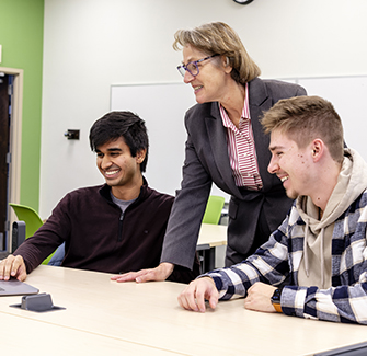 Professor Kron working with students