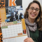 Shoshana and Calendar K Senior Shoshana Schultz hold "A Year of Food in Kalamazoo," a calendar created by her and other K students.