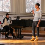 students practicing a song in the chapel
