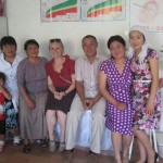 Britta Seifert ''12 in Kyrgyz Britta Seifert ''12, center, poses for a photo with health educators in a village outside of Toktogul in the Kyrgyz Republic.
