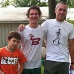Bret Linvill ’15 during his summer internship, flanked by alumni supervisor Jerry Mechtenberg-Berrigan ’97 and Jerry's son, Amos.