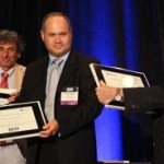 Peter Erdi wins IJCNN Award Aug 2013 Kalamazoo College Professor Peter Erdi (left), Plamen Angelov (Lancaster University), and Daniel Levine (University of Texas at Arlington) received Outstanding Service Awards at the 2013 International Joint Conference on Neural Networks. Photo by Wentao Guo.