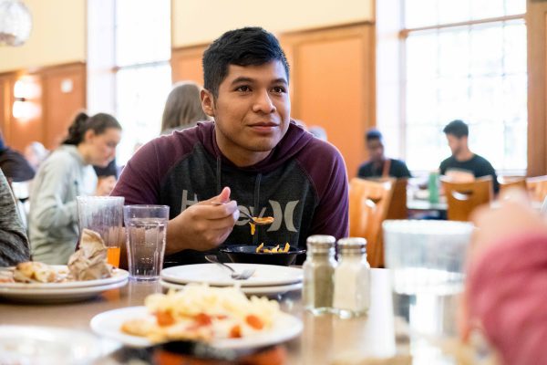 Student eating at Hicks Center cafeteria