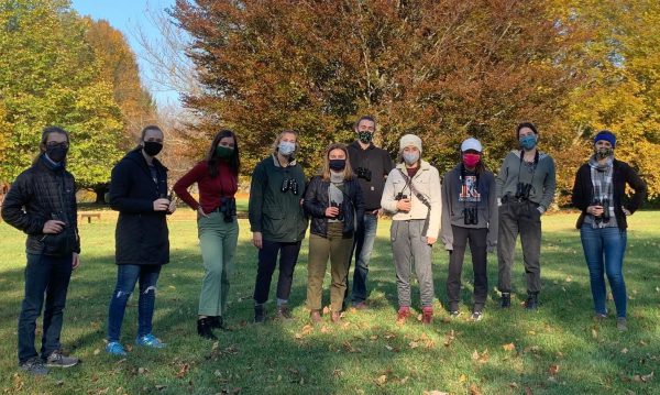 Group picture of the Kalamazoo College Birding Club with binoculars - women in science