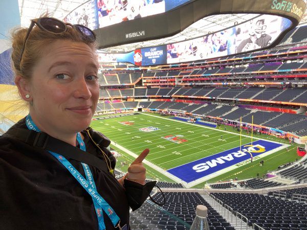 Super Bowl Halftime Planner Alix Reynolds in the empty seating bowl at Sofi Stadium