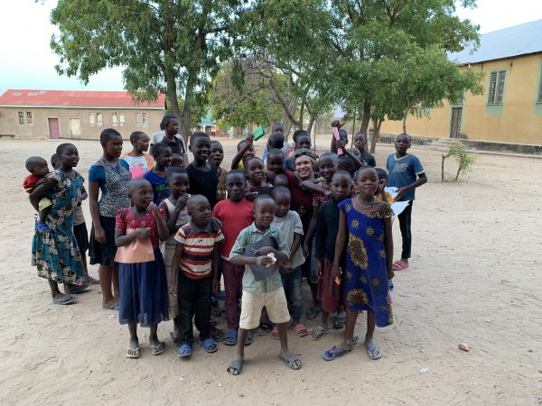 Sam Meyer with Children Who Benefit from Water Irrigation Project