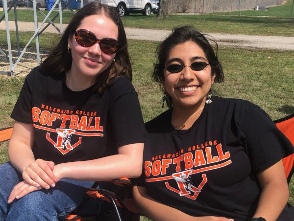 Crystal Mendoza and Isabel Morillo attend a softball game