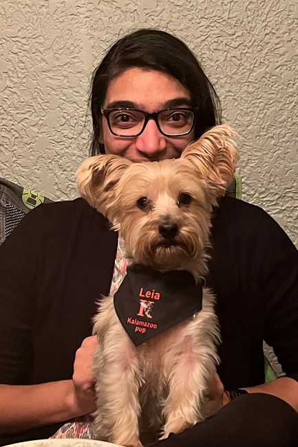 Sohini Pillai holds Yorkshire terrier Leia. Leia is wearing a K bandana