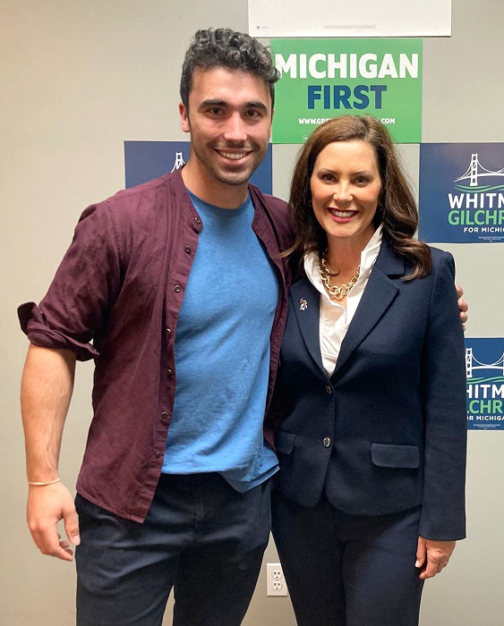 Political intern Peter Fitzgerald poses with Michigan Governor Gretchen Whitmer