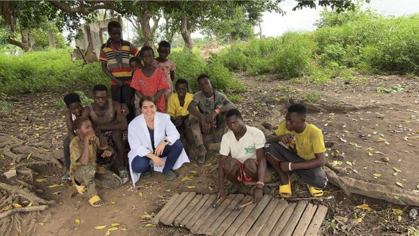 Rachel Kramer surrounded by community members