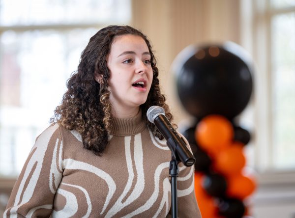 Sophia Merchant sings during Founders Day at Stetson Chapel