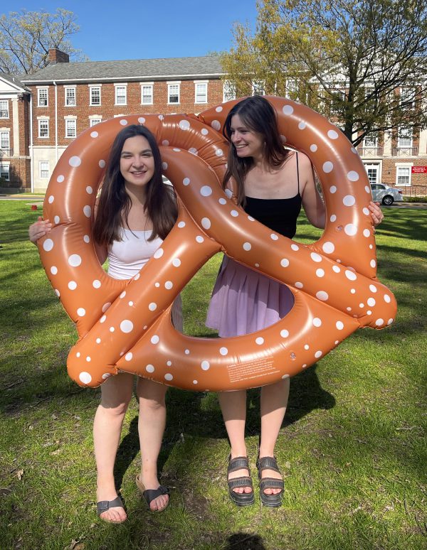 International student Claudia Klos in an inflatable pretzel