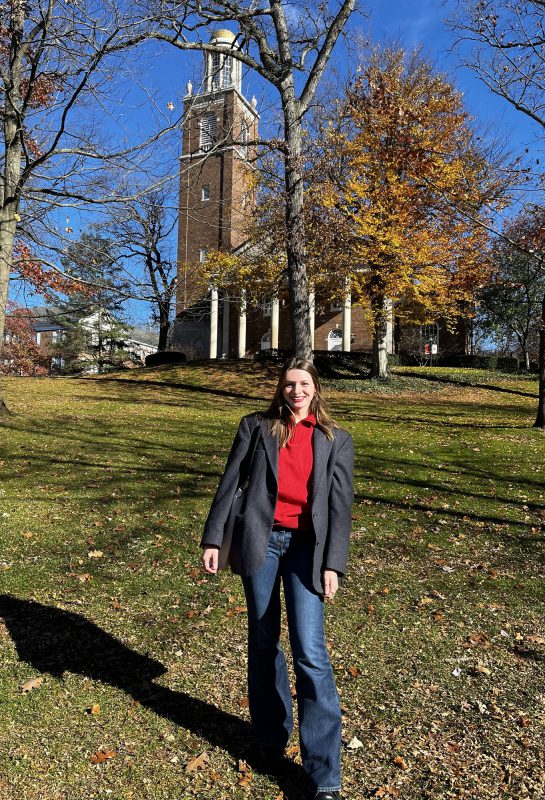 Claudia Klos poses in front of Stetson Chapel