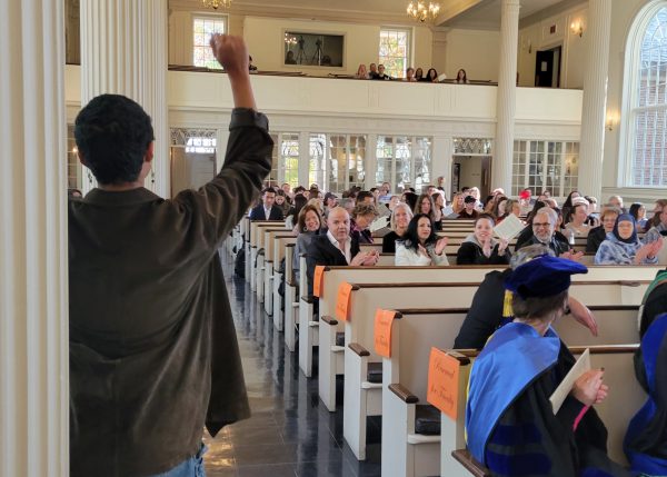 Honors Day 2023 attendees applaud a student recognized as a Posse Scholar