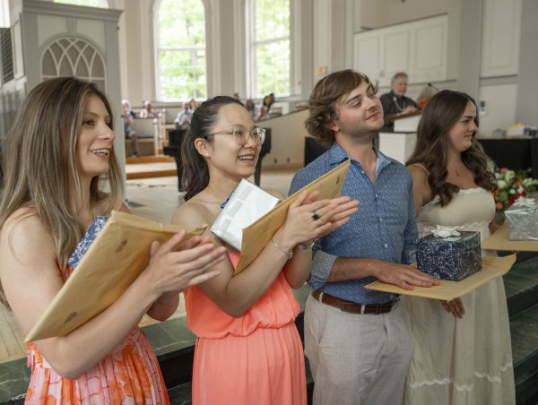 Four students support each other at the Senior Awards
