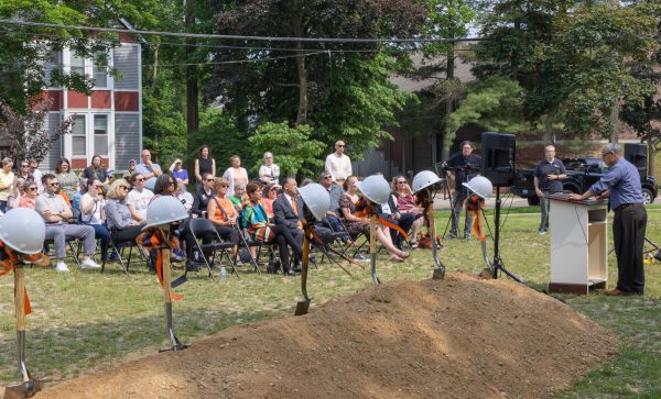 Vice President for Student Development Malcolm Smith addresses the attendees at a groundbreaking ceremony