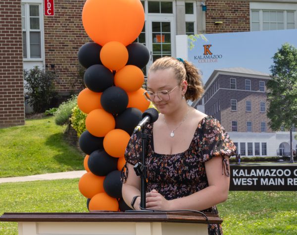 Student speaks at a lectern