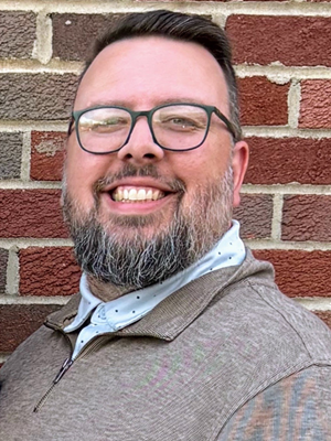 Visiting Assistant Professor of Economics and Business Matthew Schultz, new faculty, 2025