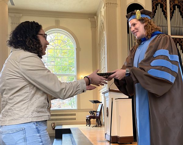 Sarah Guerrero Gorostieta '28 accepts the Department of Spanish Language and Literatures Prize from Professor of English Amelia Katanski '92 at Honors Day Convocation