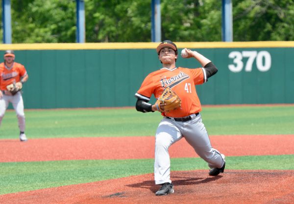 Kalamazoo Promise Scholar Adam Dorstewitz-Verne pitching for the Hornets
