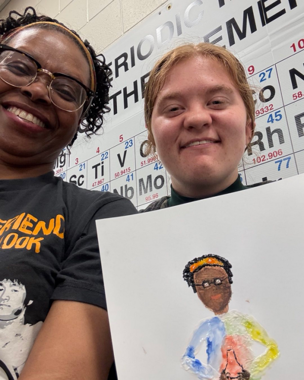 'Wait, Why': Regina Stevens-Truss with student and painting