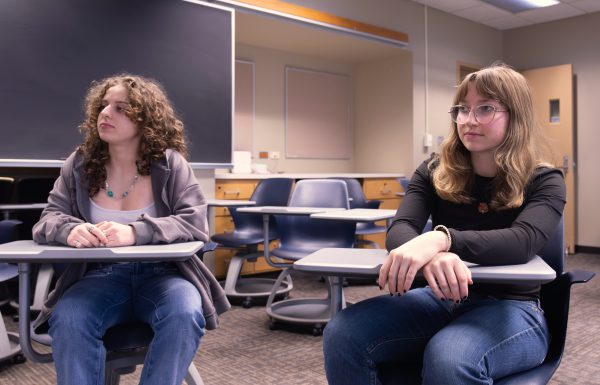 Two students listen in civil discourse and polarization course