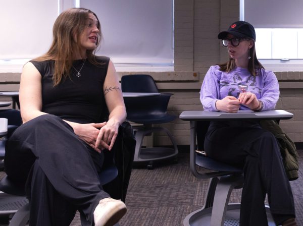 Two students talking in a polarization and civil discourse class