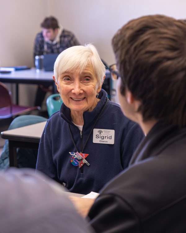 Students meet with Heritage residents in a Principles of Marketing class to talk about senior living