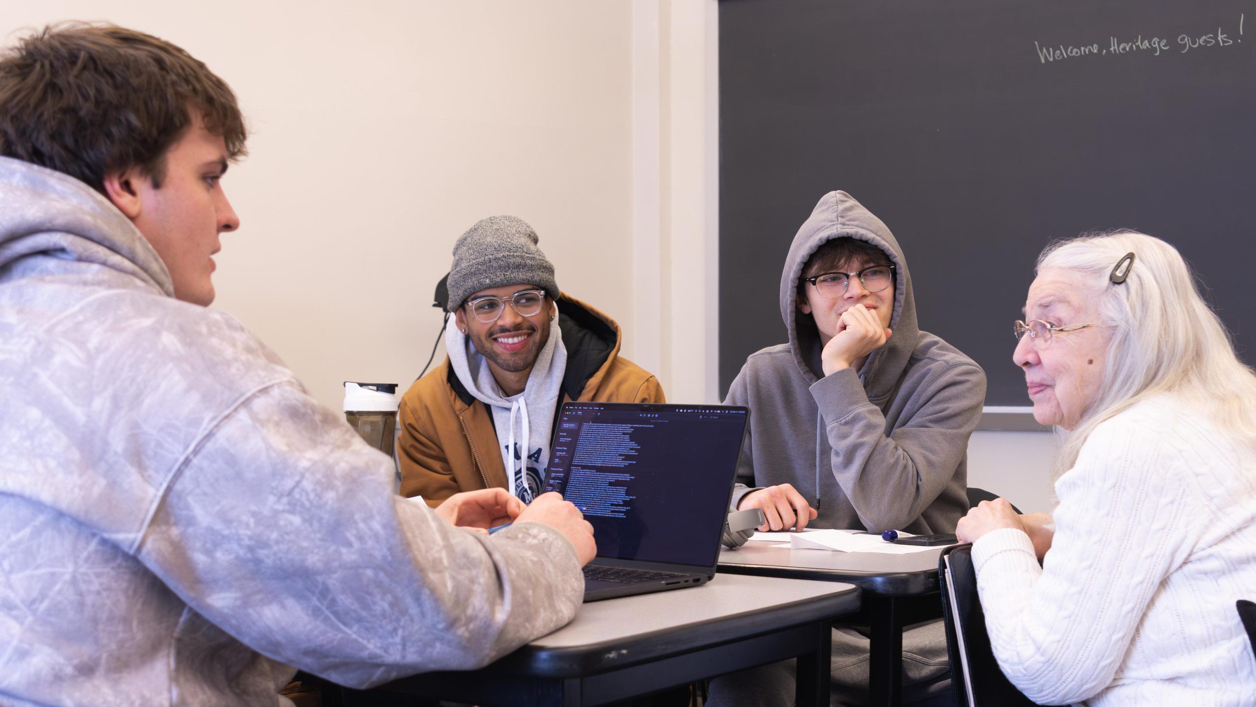Students meet with Heritage residents in a Principles of Marketing class