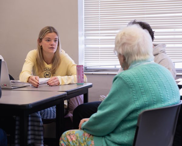 Students meet with Heritage residents in a Principles of Marketing class to talk about senior living