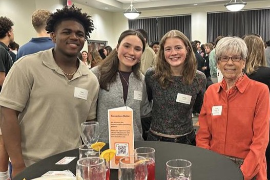 Three students and an alumna talk during Beyond the Game