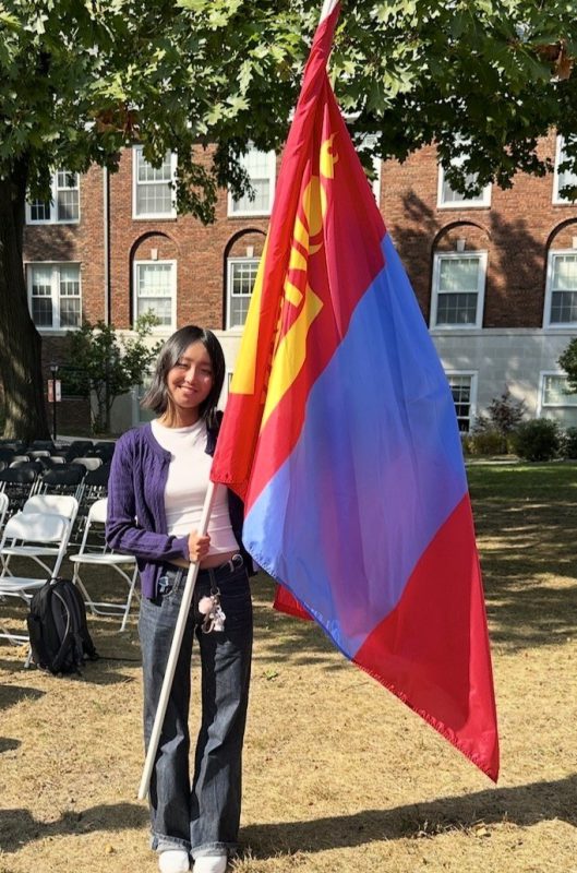 Student with Mongolia flag at Convocation