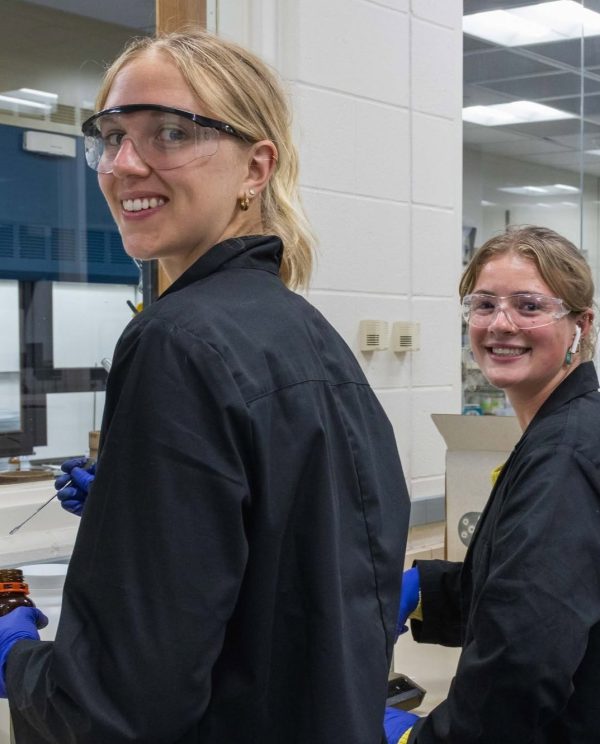 Olivia Cannizzaro works in the chemistry lab with Anni Schnell