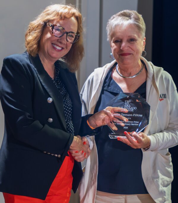 President Crowley congratulates Louise Tennant-Filkins on earning the Ambrose Prize.