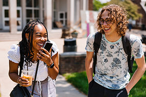 two students laughing