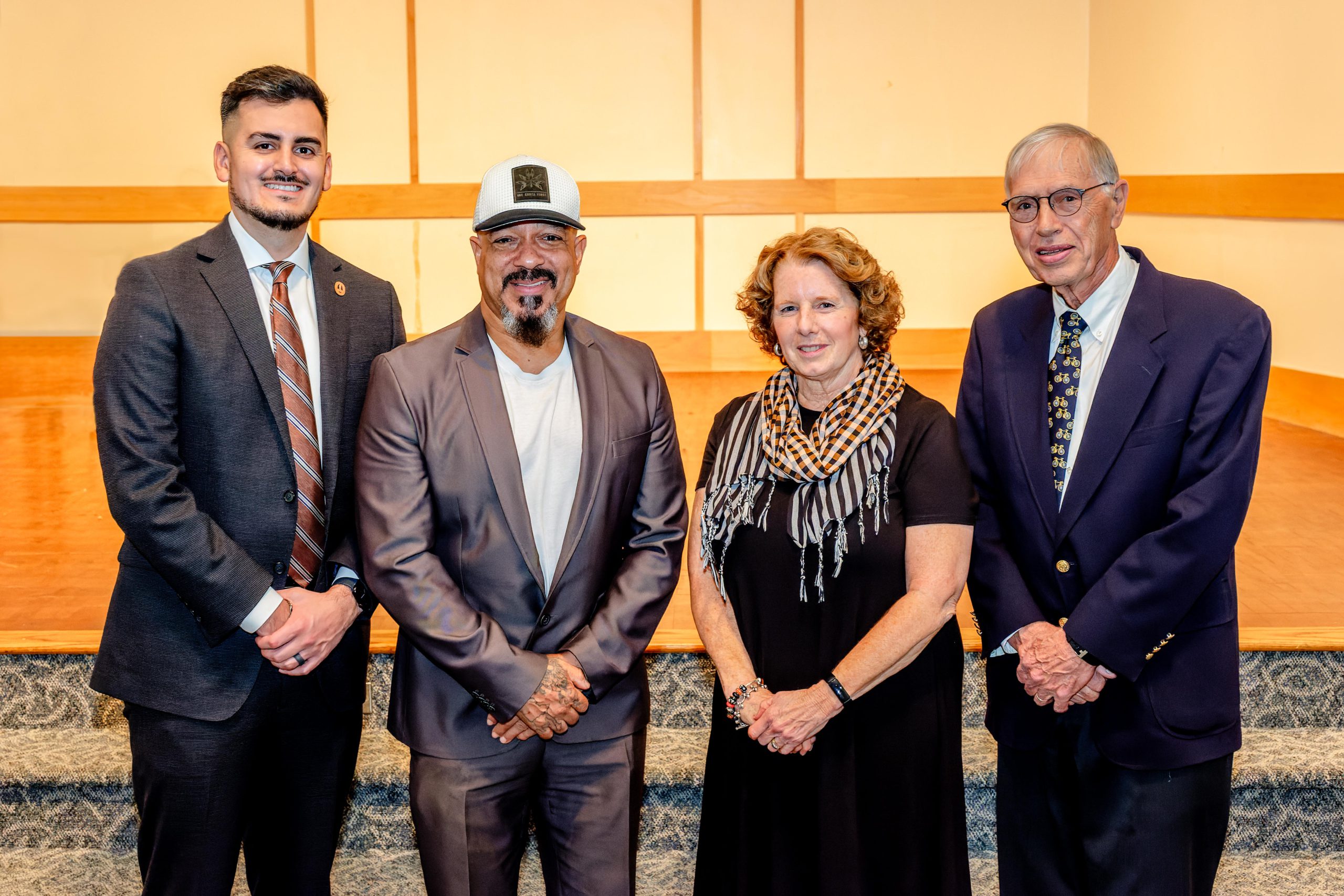 L to R: Darrin Camilleri ’14, Freedom Williams (on behalf of his great-great grandfather, Rufus Perry), 
Melanie Williams and Don Schneider ’