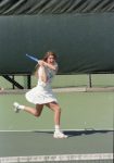 2025 Eve Halderson action shot while playing tennis at Kalamazoo College.