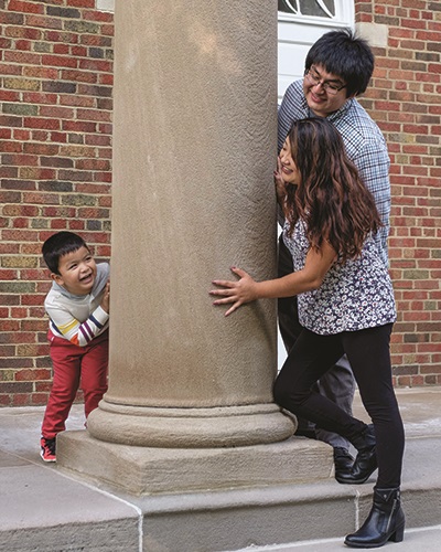 Moises Hernandez with his wife and son at Stetson Chapel