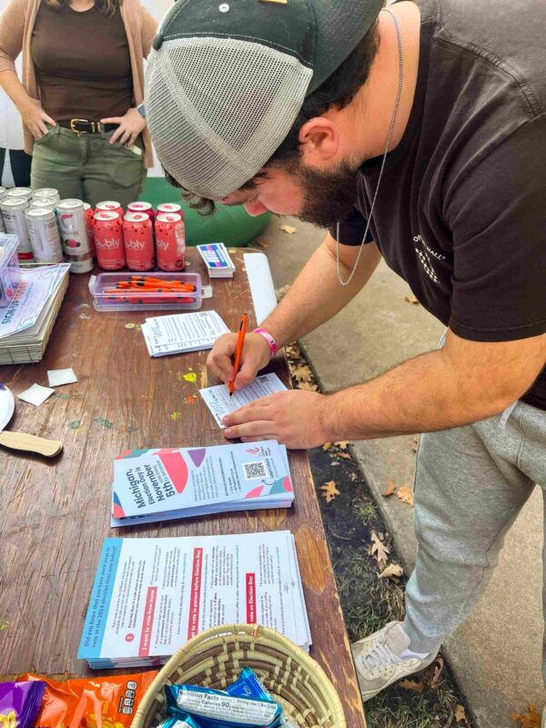 Students pledge to vote in the 2024 election. 