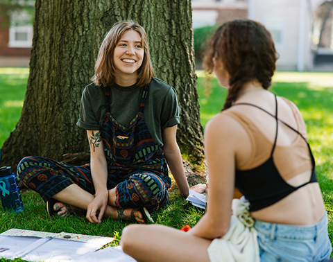 Two students on the quad