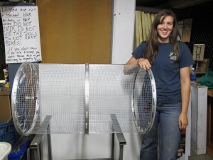 Compost Intern Sammy Jolly works toward creating a bicycle