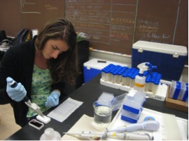 Monica Cooper ′14 in a lab