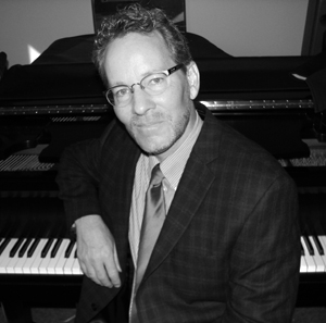Cedarville University Professor John Mortensen at a piano