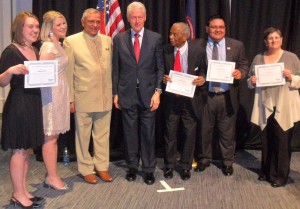 Abigail Miner with President Clinton and other award recipients at the Democratic Party dinner