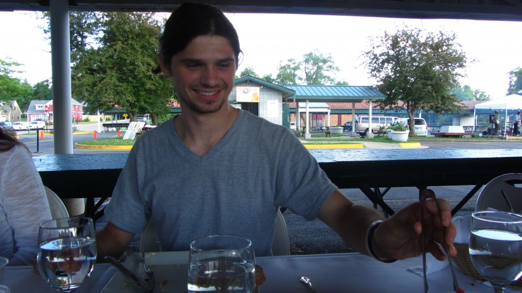 Dylan Polycn '15 helped serve the kale salad at the Fair Food Matters fundraiser