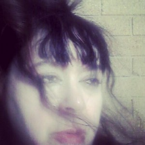 Faded portrait of Diane Seuss