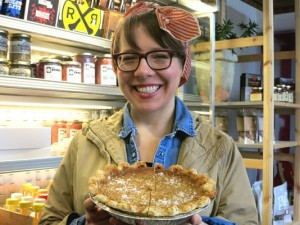 Lisa Ludwinski holding a pie