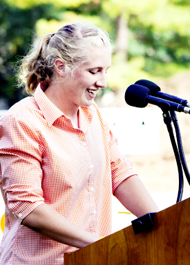 Grace Smith at a podium
