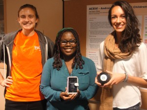 K students (l-r) Natalie Davenport ’16, Octavia Smith ’18 and Melany Diaz ’16 showed local 6th- and 7th-grade girls that there is no magic to learning computer science.