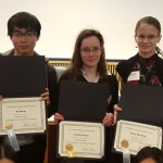 Students display awards from Japanese speaking contest